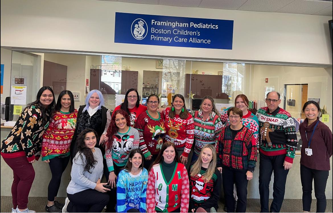 a group of people dressed in christmas attire