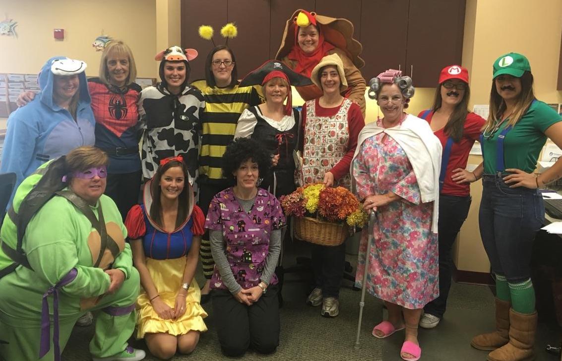 a group of medical professionals in costumes