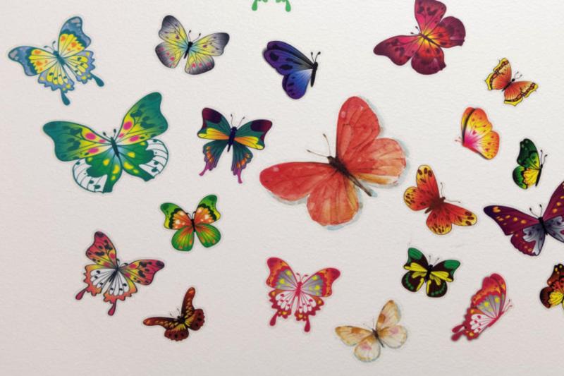 butterfly stickers on a white wall